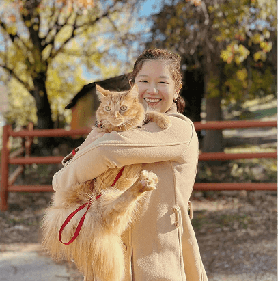 Nopmanee with her cat