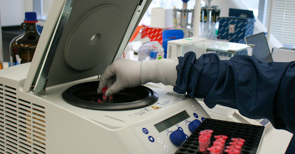 Placing sample tubes in centrifuge
